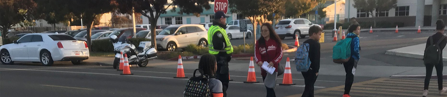 police helping people cross the street